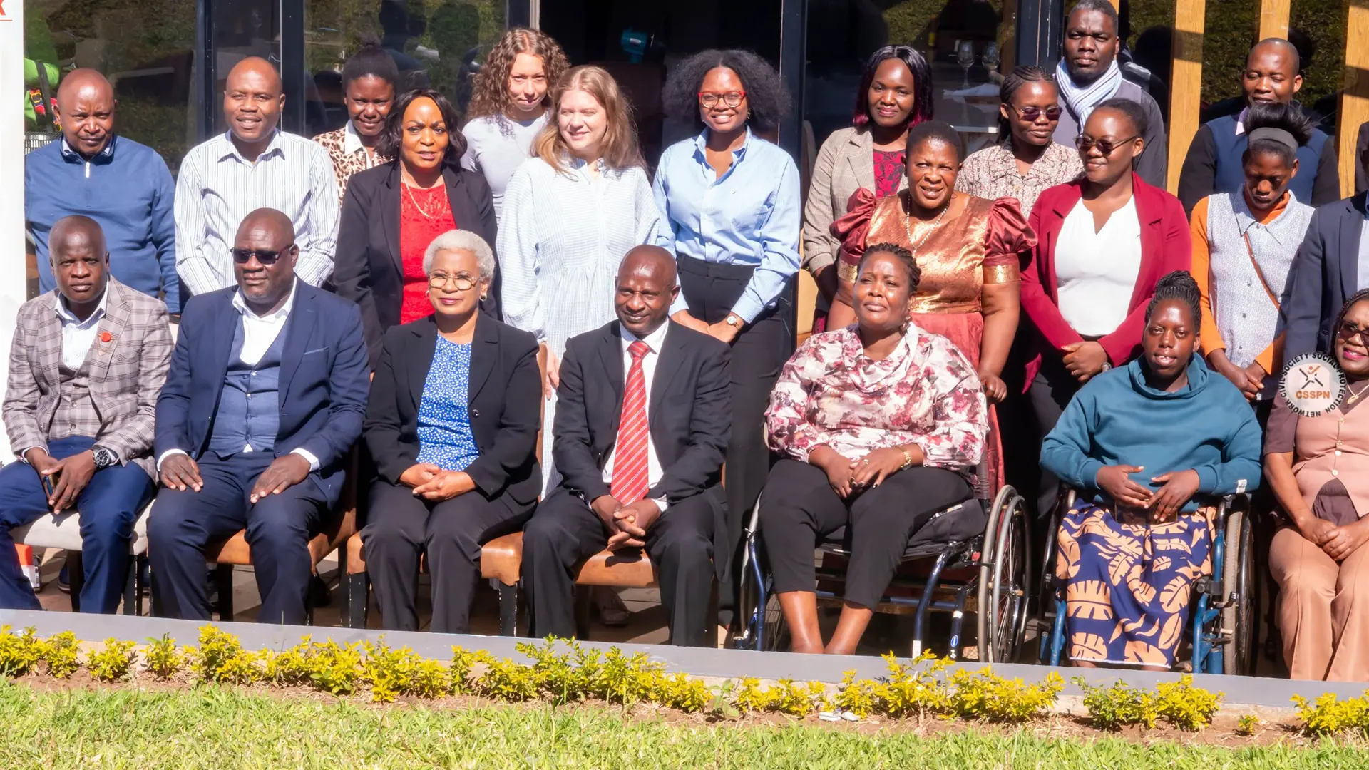 CSSPN network members and international partners, including women wheelchair-users, gathered for a group photo